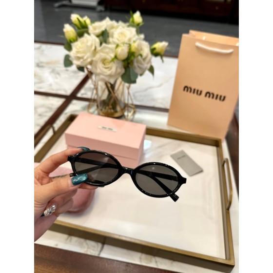 Miu Miu Black Oval Sunglasses